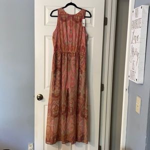 Sleeveless dress with shorts under.